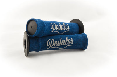 Oxford blue knit grip covers with the Pedaler logo embossed in silver