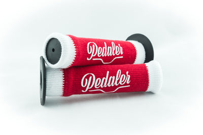 red knit grip covers with white trim and the Pedaler logo embossed in silver